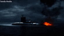 a picture of a submarine on fire with sanda media written above it