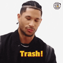 a man with a braided haircut says trash