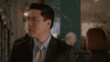 fresh off the boat worried randall park louis huang concerned