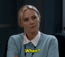 a woman with a lanyard that says police on it says when