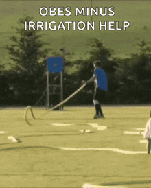 a person pulling a rope on a field with the words obes minus irrigation help
