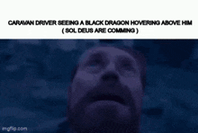 a caravan driver seeing a black dragon hovering above him is comming