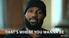 a man with a beard wearing a beanie says that 's where you wanna be netflix