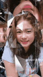 a picture of a girl with triangles around her face and the hashtag @gram.orut