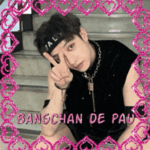 a young man giving a peace sign with bangchan de pau written on the bottom