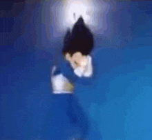 a blurry picture of vegeta from dragon ball z covering his ears .
