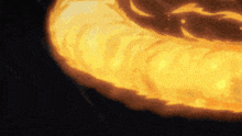a close up of a fireball with a dark background