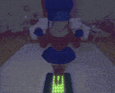 a girl in a blue hat is standing in front of a computer keyboard