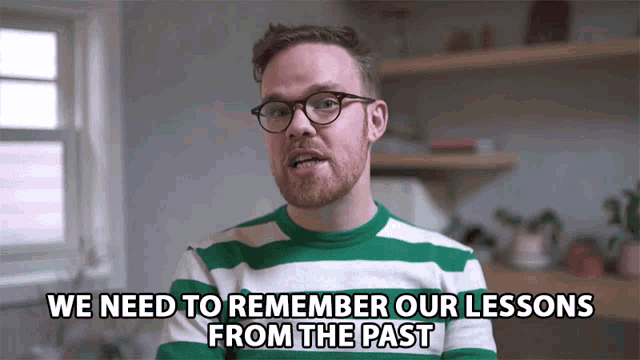 a man with glasses and a green and white striped shirt says we need to remember our lessons from the past