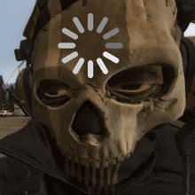 a close up of a skull with a loading circle on it