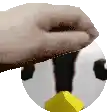 a hand is holding a cd with a penguin on it .