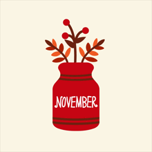 a red mason jar with the words november on the side