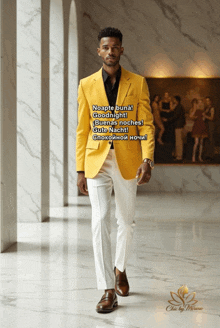 a man in a yellow jacket and white pants is walking