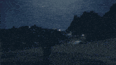 a pixelated image of a person standing on top of a hill