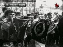 a black and white photo of a marching band with the date of march 19th 1915