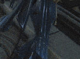a close up of a person 's pants with a belt that says ' t.o.t. ' on it