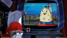 a cartoon character is sitting in front of a television with the word caution on the bottom