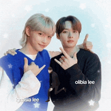 two young men posing for a picture with the name olivia lee below them