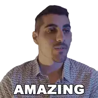 a man with a beard and a shirt that says amazing on it