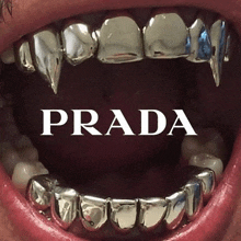 a close up of a person 's mouth with prada written in white