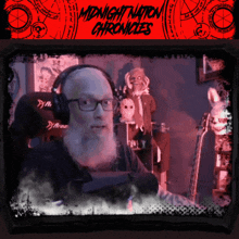 a man wearing headphones sits in front of a midnight nation chronicles banner