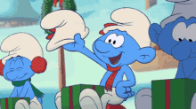 The Smurfs Christmas GIF - The Smurfs Christmas Opening Gifts GIFs