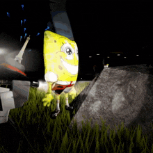 a cartoon spongebob is standing next to a rock