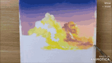 a painting of clouds is being painted with white and violet paints