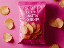 a bag of cheekies mastro chinchips sits on a pink table