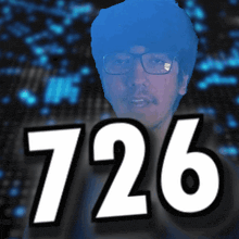 a picture of a man with glasses and the number 726 behind him