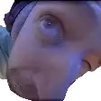 a close up of a person 's face with a blue background .