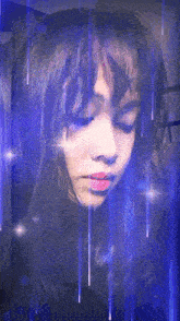 a close up of a woman 's face with blue lights coming out of it
