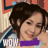 a woman is giving a thumbs up and the word wow is behind her