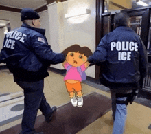 two police officers are holding dora the explorer while wearing police ice jackets