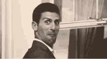 Novak Djokovic Rigole GIF - Laugh Giggle Oh GIFs