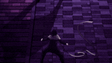 a man in a mask stands on a brick sidewalk at night