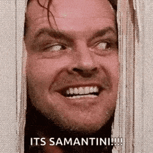 a close up of a man 's face with the words `` it 's samantini ! '' written on the bottom .