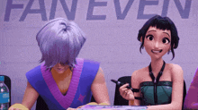 a man and a woman are sitting in front of a sign that says fan even
