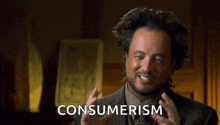 a man in a suit and tie says consumerism with his hands outstretched