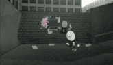 a black and white cartoon of a person with a fist in front of a brick wall .