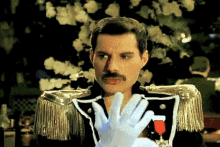 Queen Freddie Mercury GIF - Queen Freddie Mercury Gloves GIFs