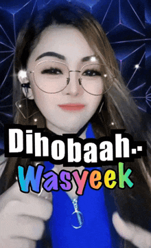 a woman wearing glasses and a blue shirt with the words dihobaah wasyeek written on it