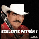 a man in a cowboy hat is holding a guitar and says " exlente patron "