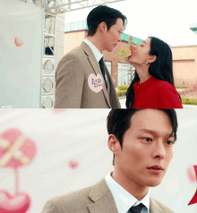 a man in a suit kisses a woman on the cheek while wearing a heart shaped badge