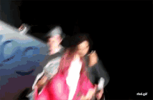 a blurry picture of a woman dancing with the words rbd.gif below