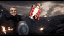 a man is holding a trophy with a crown on top