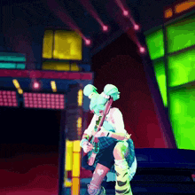 a girl with a guitar is sitting on a bench in a neon room