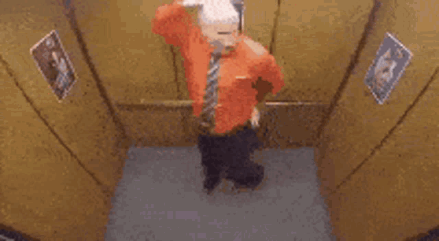 police-dancing-in-the-elevator-boogerman.gif