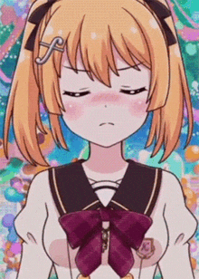 a girl in a school uniform with a purple bow is making an angry face .