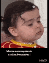 a baby 's face is shown in a video taken by telegrami_ali_clip0